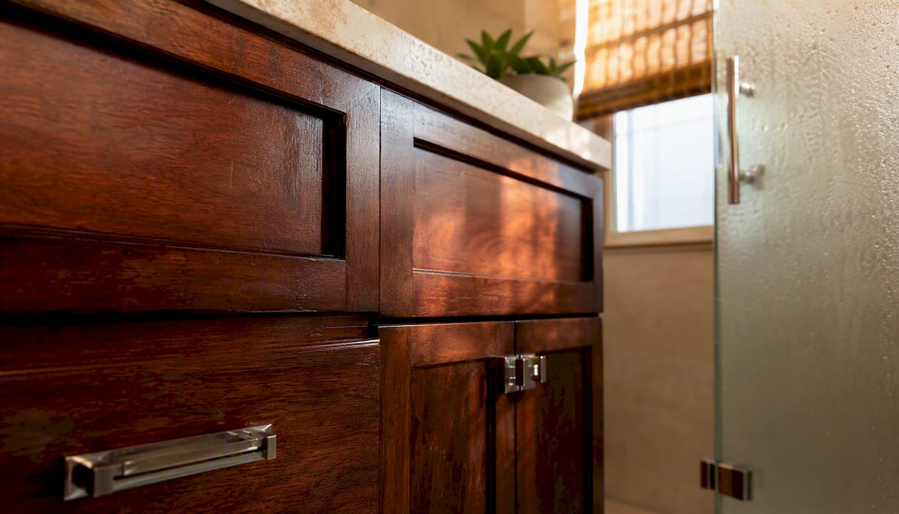 Close-up of warm wood vanity cabinetry