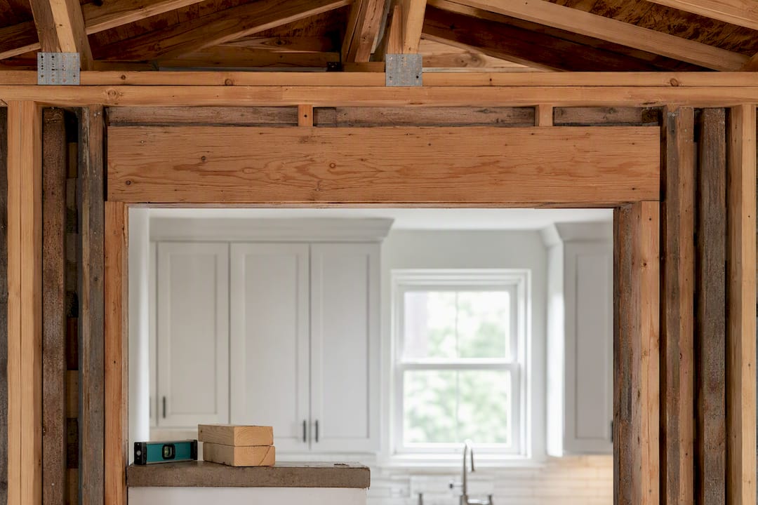 Exposed kitchen wall header and roof framing