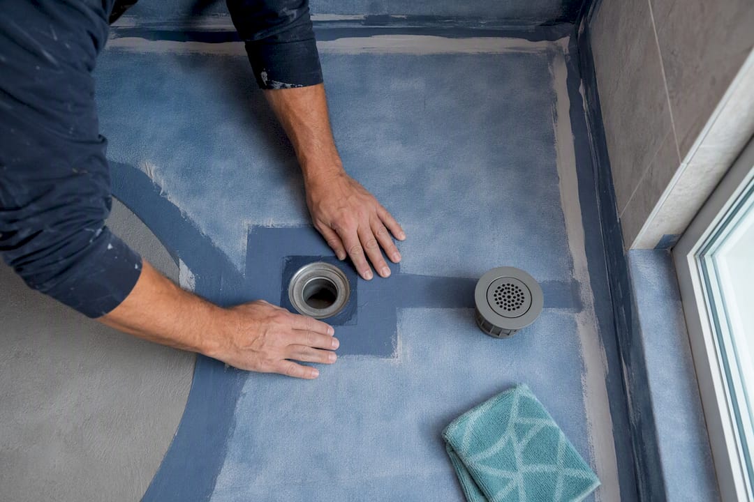 Waterproofing membrane around shower drain