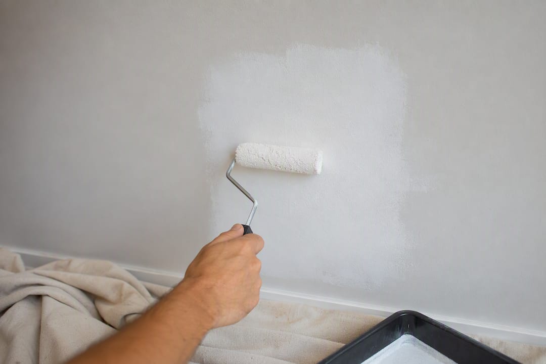 Priming a repaired drywall patch