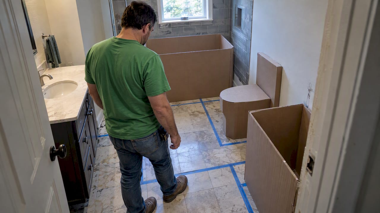 Cardboard templates test bathroom fixture clearances